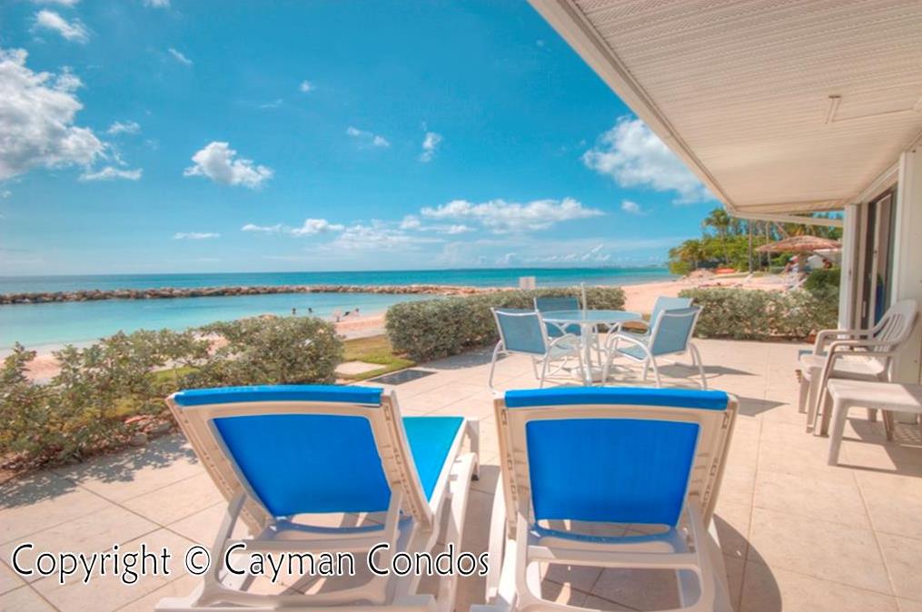 Relax on an oceanfront patio less than 50 feet from water's edge