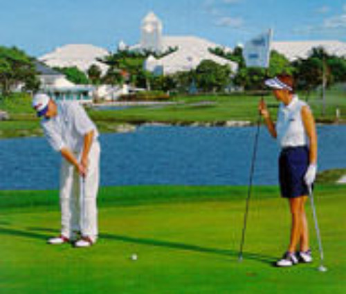 Man putts while woman holds flag