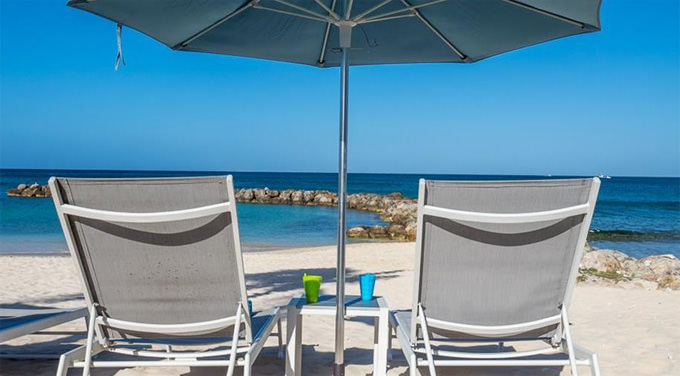 two chairs at a cayman beach